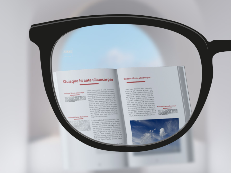  Obrázek zorného pole s knihou přes brýlové čočky ZEISS Single Vision ClearView, přes které je ostře vidět vše kromě oblasti, která je výrazně vně čoček. 