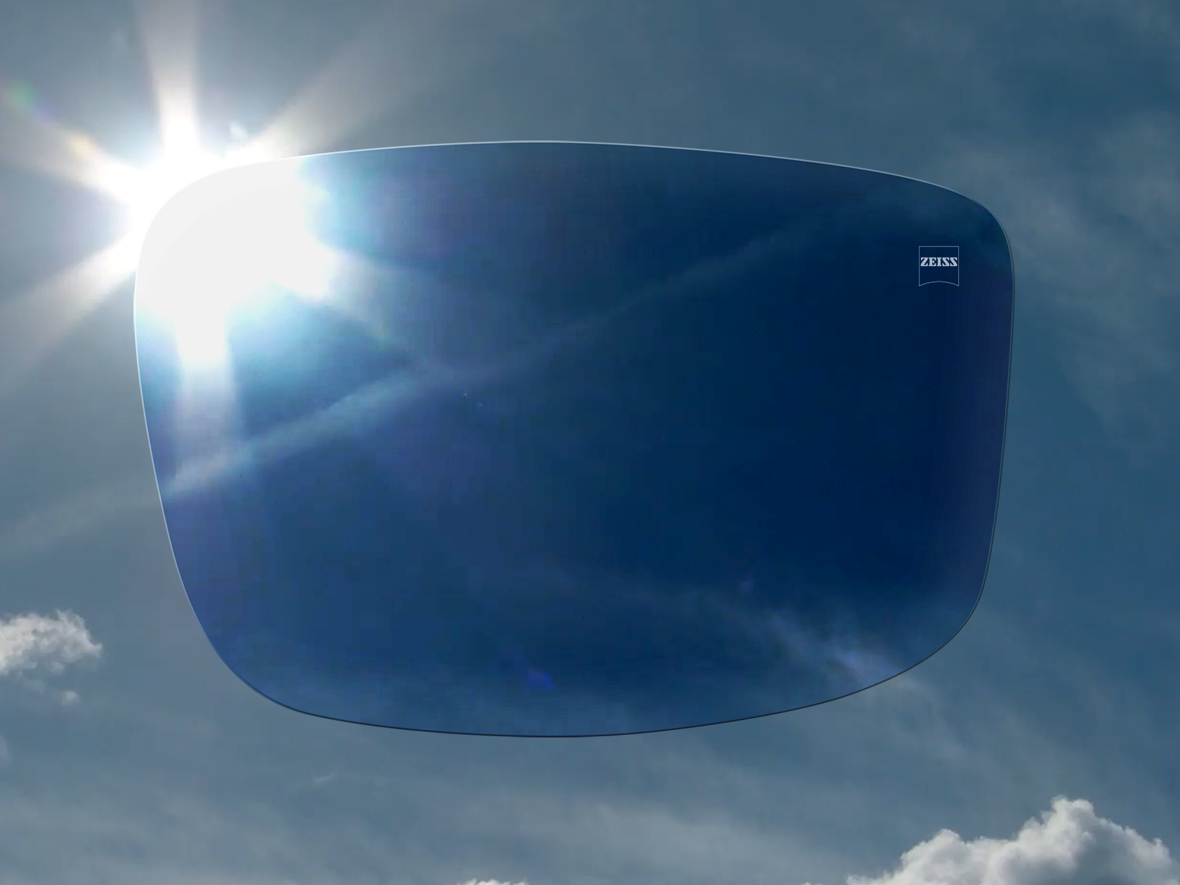Snímek, který zobrazuje, jak se brýlové čočky ZEISS PhotoFusion mění z čirých na tmavé. 
